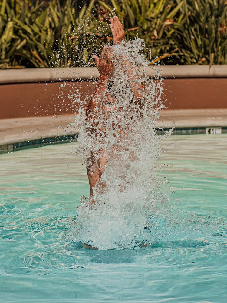 A Person Playing With Water