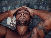 Man With Black Tattoo on His Right Hand
