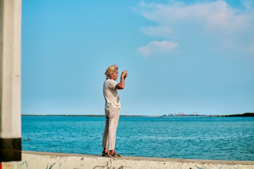 Man Standing on Seaside