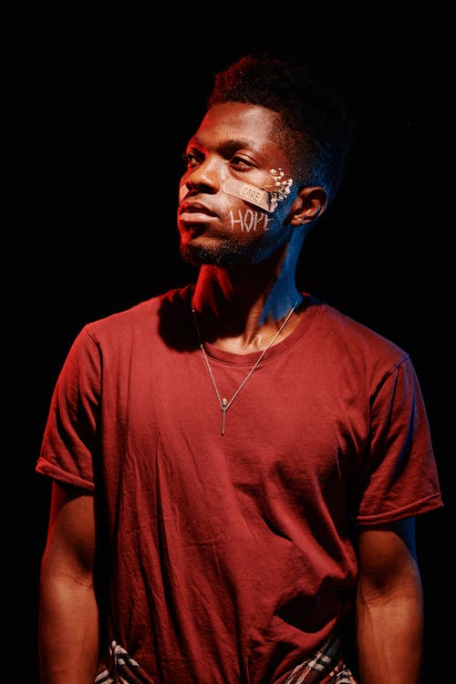 Portrait of an African Man with Plaster on Face 