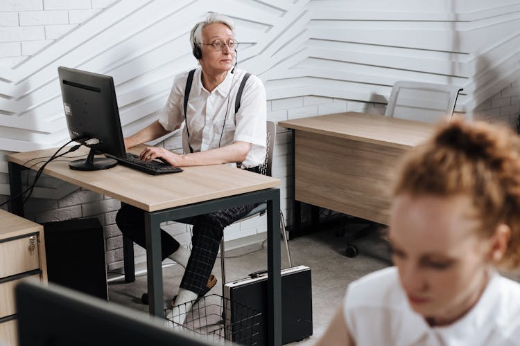 Shallow Focus Of A Man Working In The Office