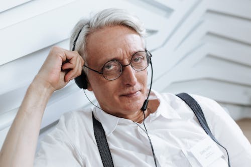 Free A Call Center Agent Wearing a Headset  Stock Photo