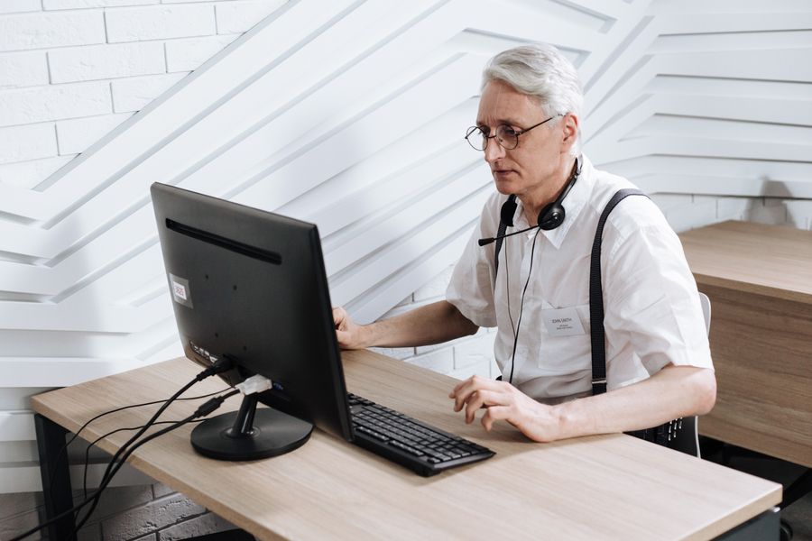 Call center agent handling customer support work at a service desk