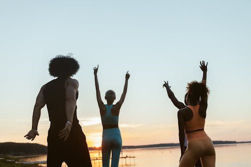Free People Raising their Hands Stock Photo