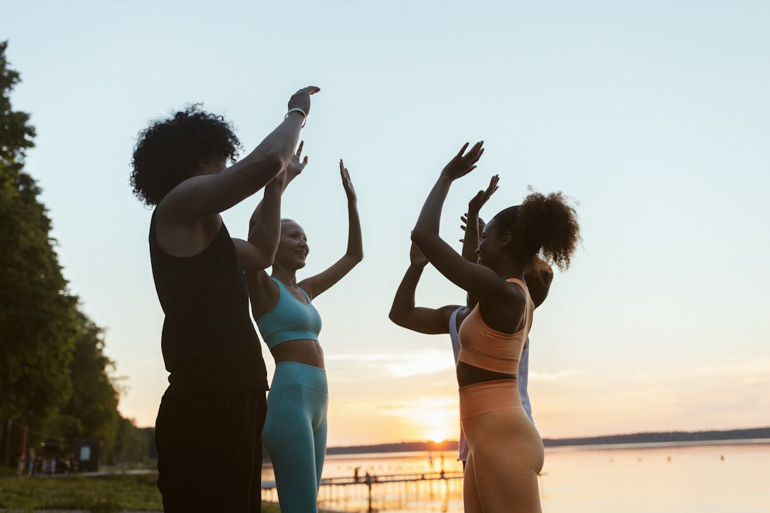 Free People Raising their Hands Stock Photo