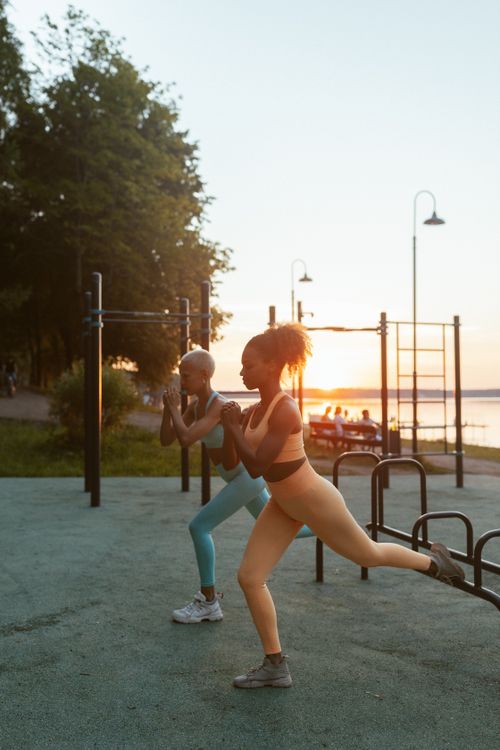 Woman in workout clothes stretching before exercise