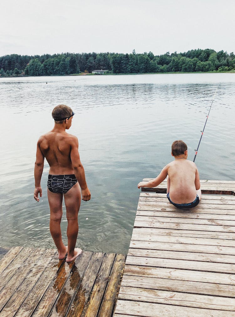 Boys Fishing On Pier