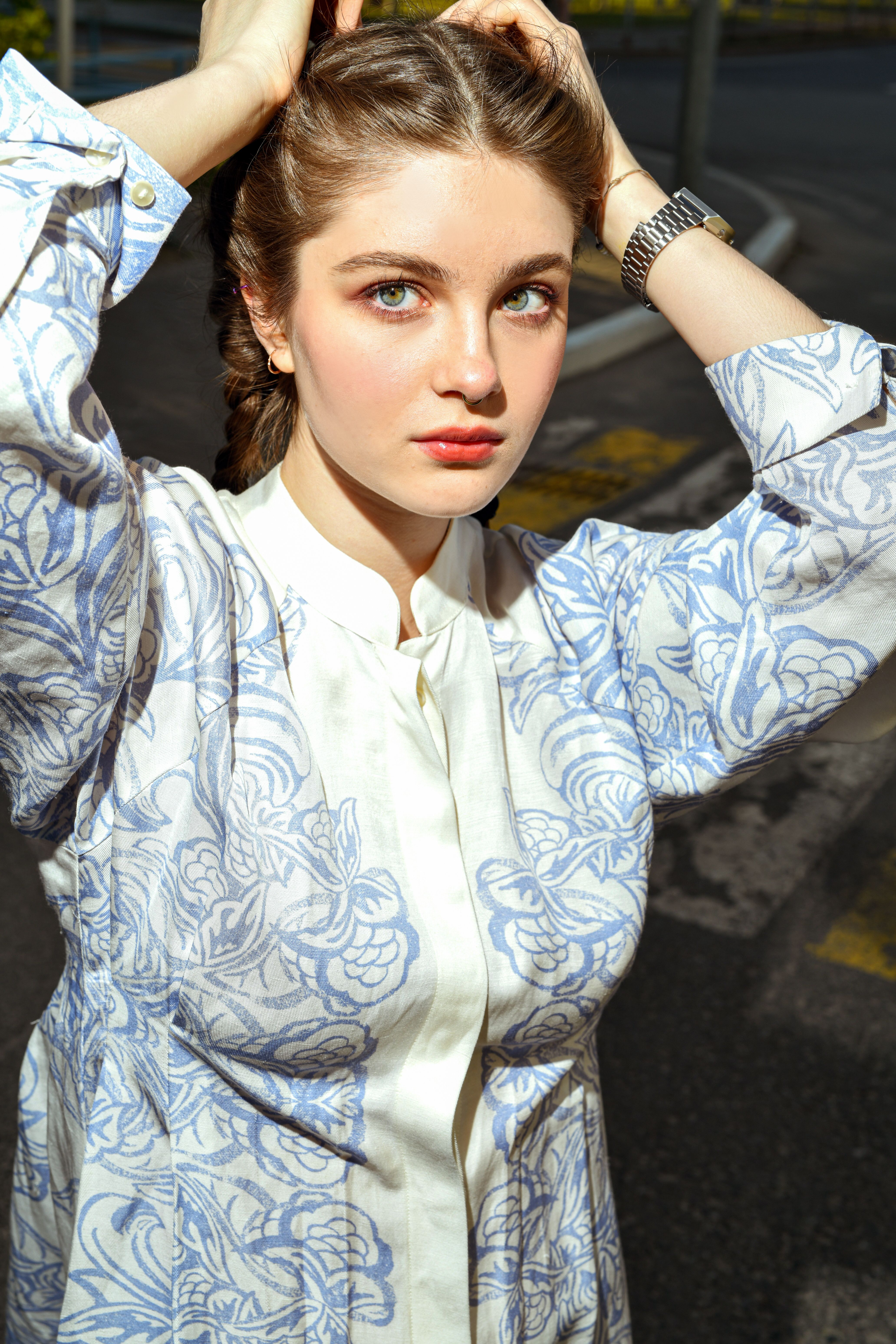 Beautiful Woman in White and Blue Floral Long Sleeve Shirt · Free Stock ...