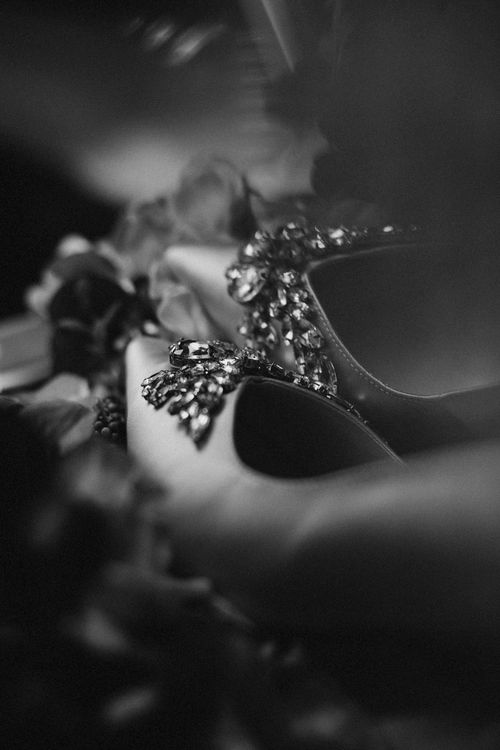 Free Stylish black and white close-up of a jeweled high heel, exuding elegance and luxury. Stock Photo