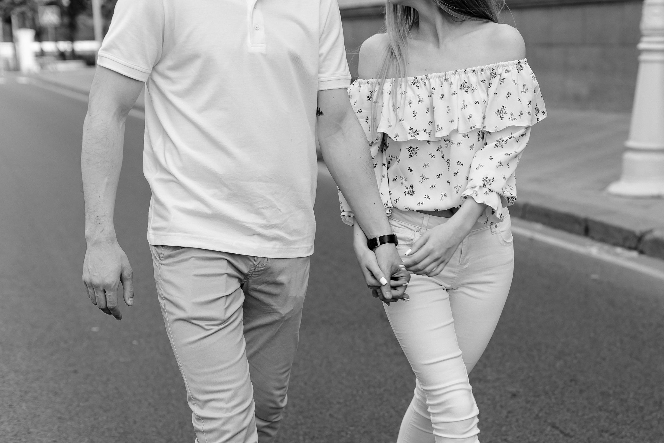 Man and Woman Holding Hands While Walking · Free Stock Photo