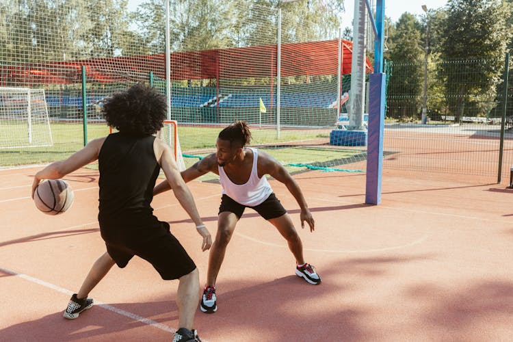 Men Playing Basketball