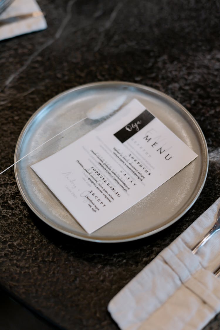 Restaurant Menu On A Silver Plate 