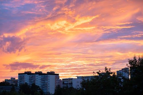 Foto profissional grátis de alvorecer, cair da noite, centro da cidade