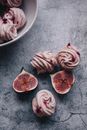 A Close-Up Shot of a Sliced Fig and Meringue
