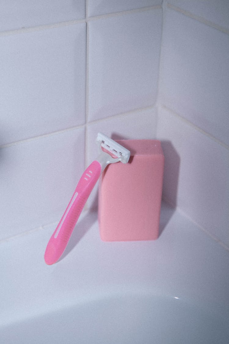 
A Shaving Razor Leaning On A Soap