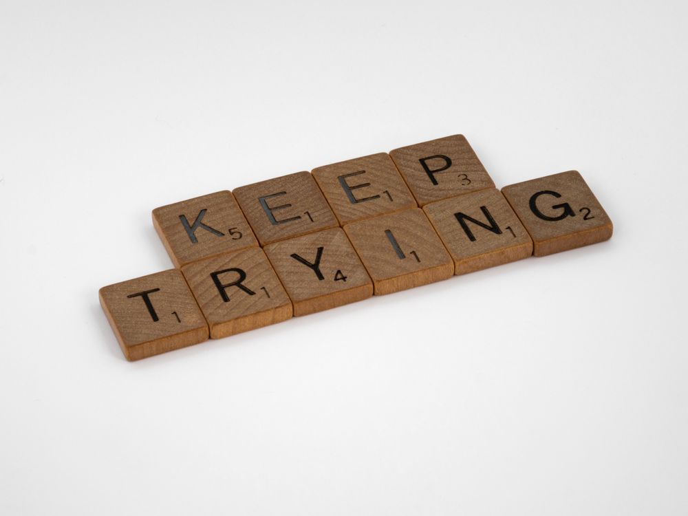 Scrabble Tiles on a White Background · Free Stock Photo