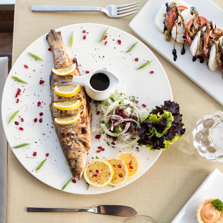 Cooked Fish On White Ceramic Plate