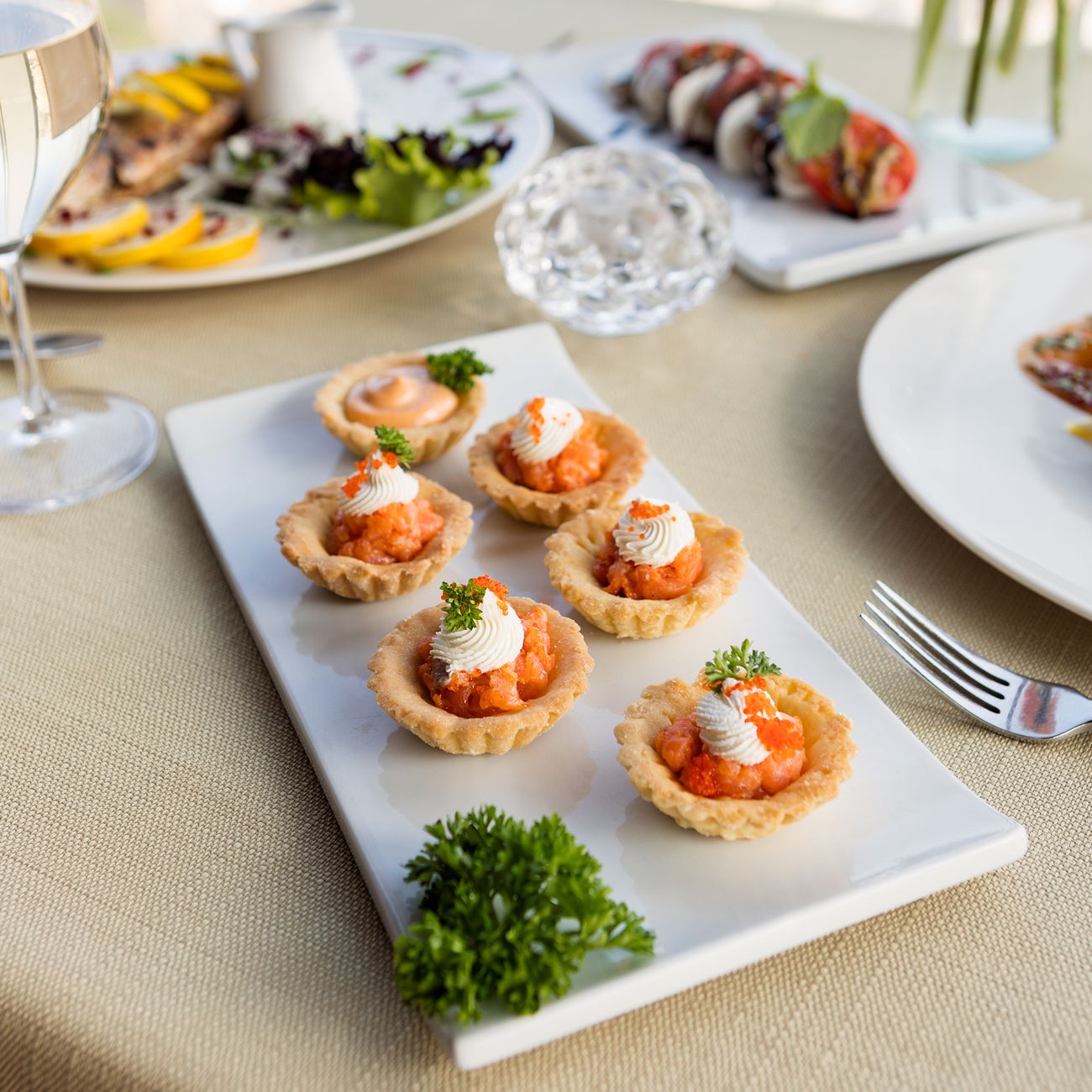 Sophisticated gourmet appetizer presentation at an elegant dining setup, perfect for culinary enthusiasts.