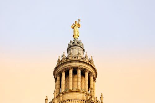 Civic Fame Statue on Top of the Building 