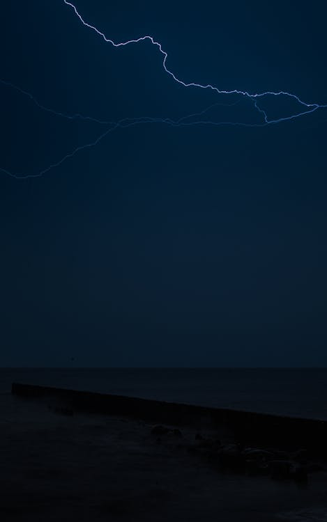 A Lightning Strike Across the Night Sky 