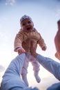 A Person Carrying a Baby