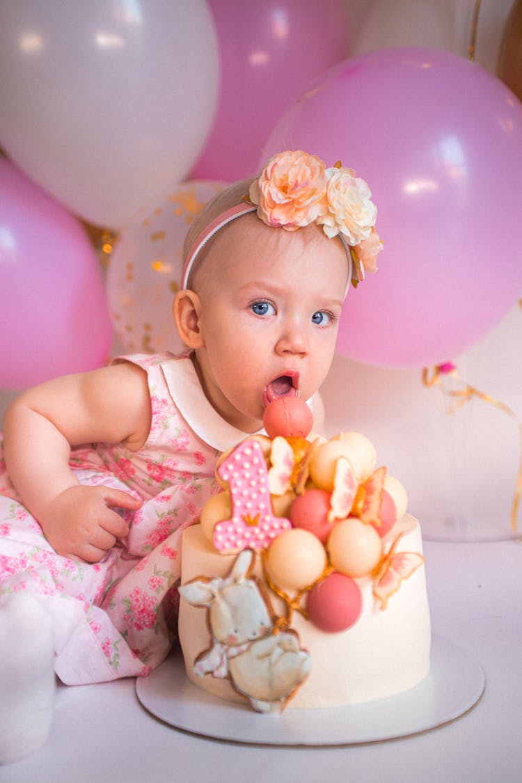 Baby Girl Eating Birthday Cake