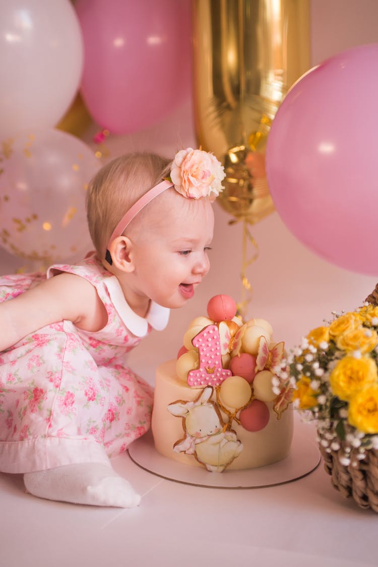 Baby Girl With Birthday Cake