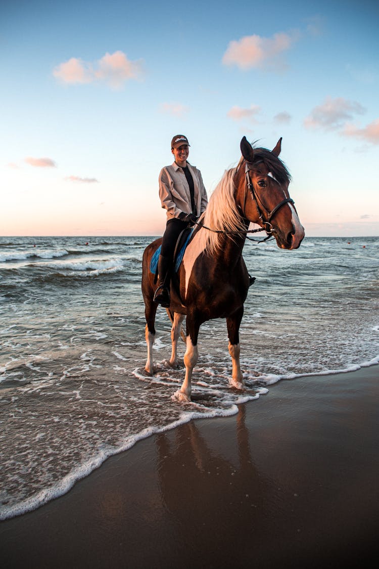 Smiling Man On Horseback On The Beach 