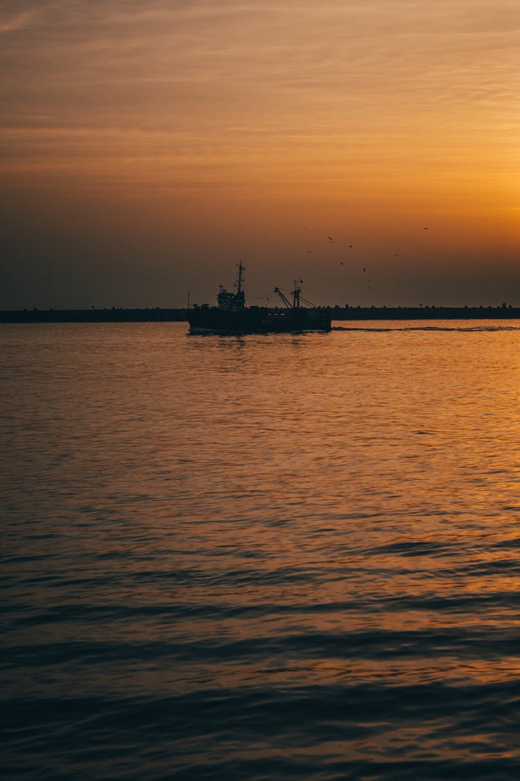 Trawler At Sunrise