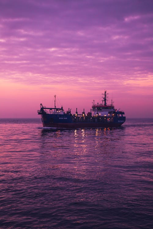 Illuminated Ship at Dusk 