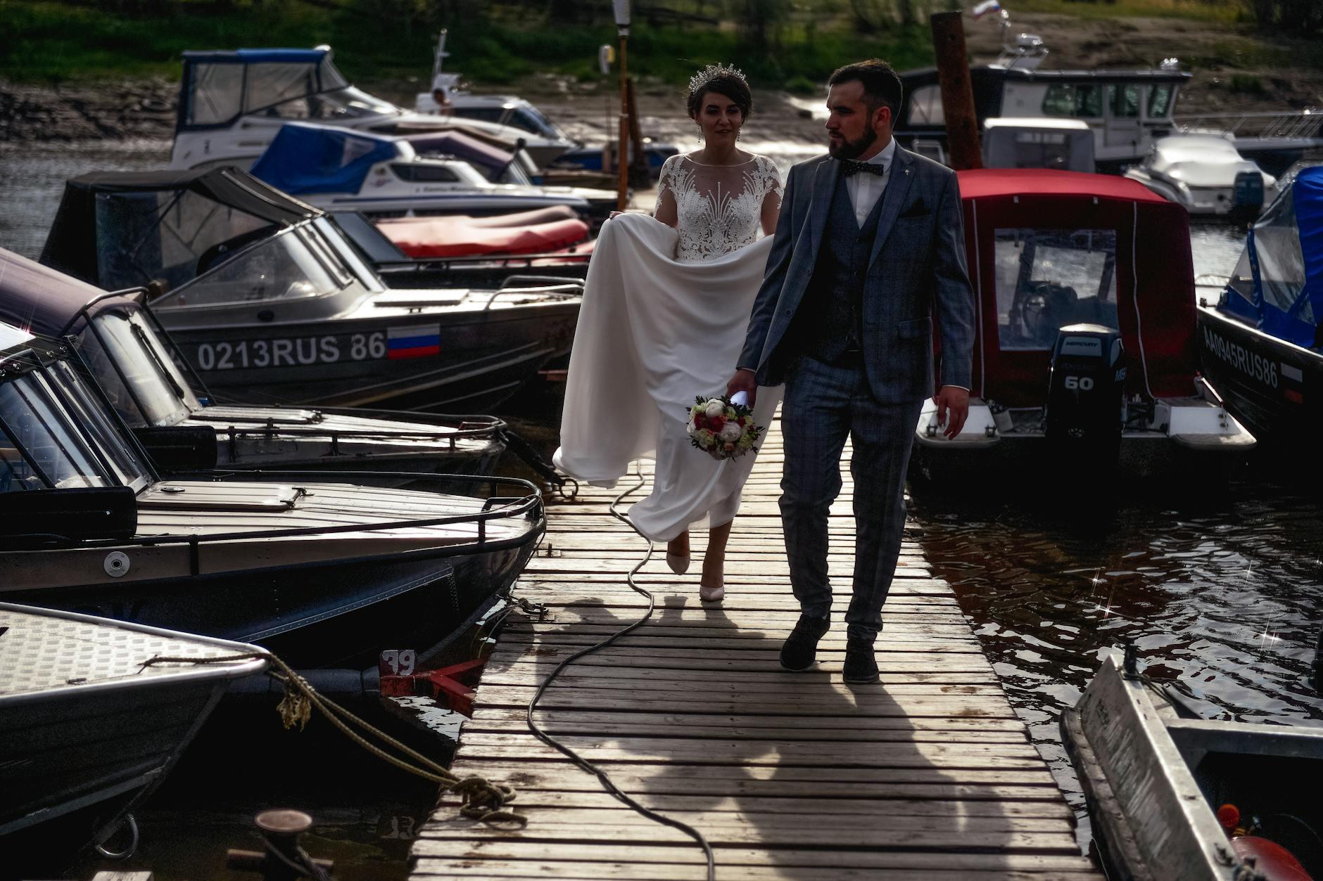 Couple during their elopement ceremony at a San Antonio River Walk landmark