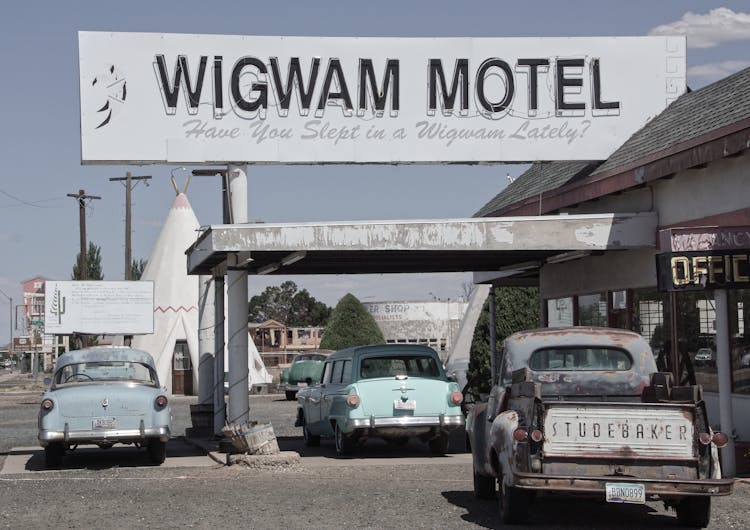 Cars Parked In Front Of Wigman Motel