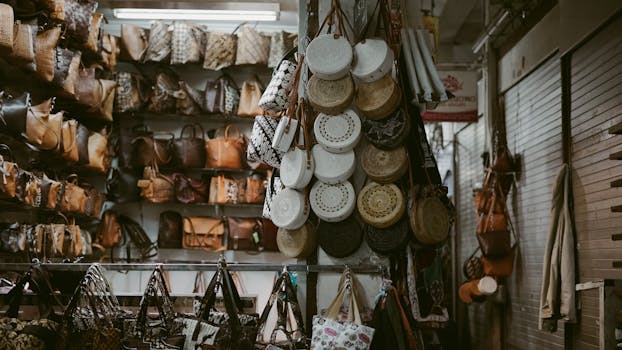 A variety of handcrafted bags displayed in a Yogyakarta market shop, showcasing local craftsmanship.