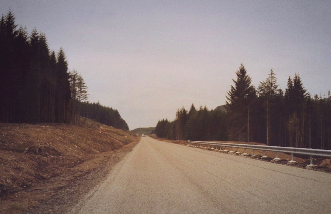 View Of An Empty Unpaved Road In The Countryside