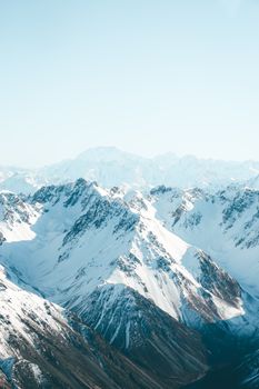 Breathtaking view of snow-covered peaks in Canterbury, New Zealand.
