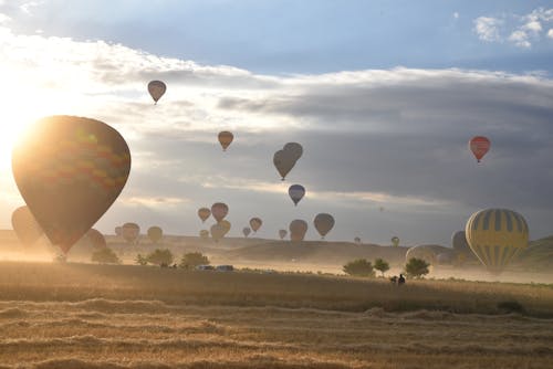Foto stok gratis balon udara, matahari terbit