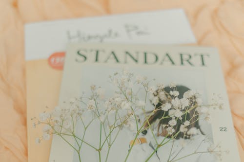 White Flowers on Magazines