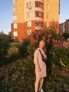 Woman Standing Near Green Plants
