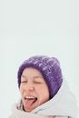 A Woman in Purple Beanie