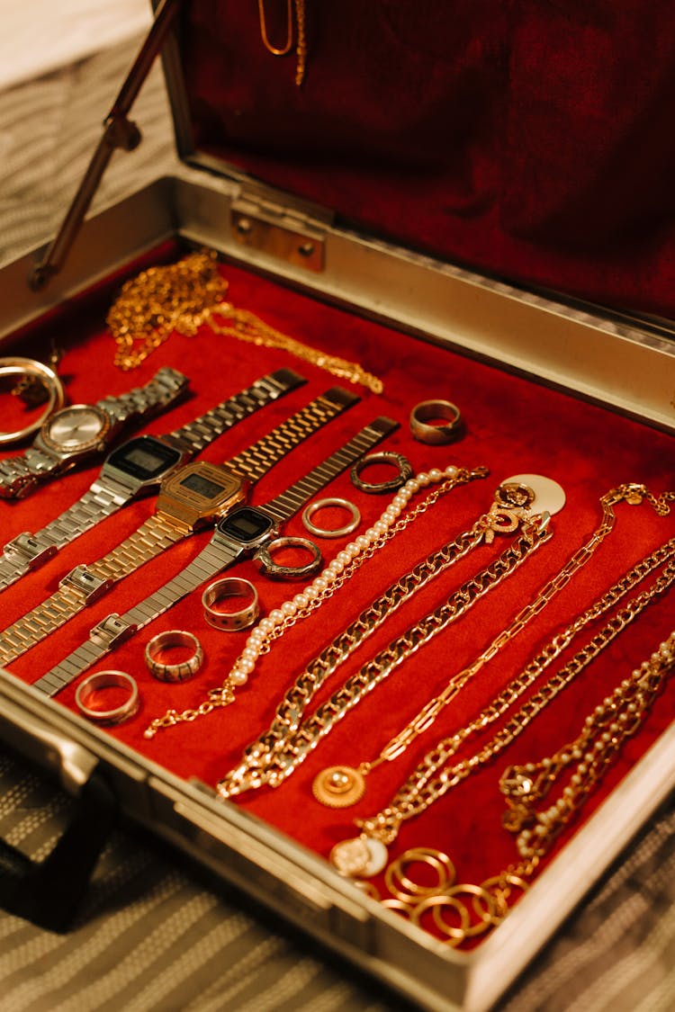 Close Up Photo Of Jewelries And Watches