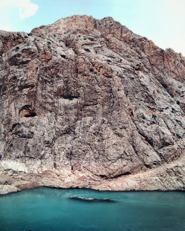 Drone Shot of a Rock Formation near a Body of Water