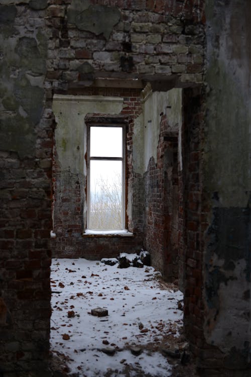 Interior of a Ruined Building in Winter 