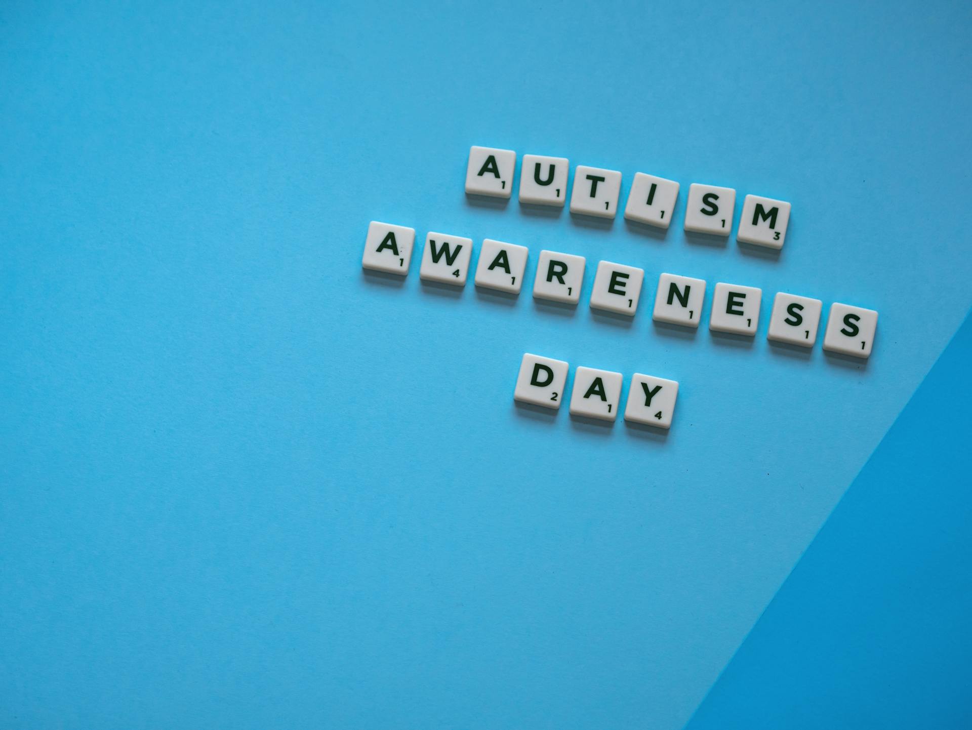 Scrabble Tiles That Says Autism Awareness Day