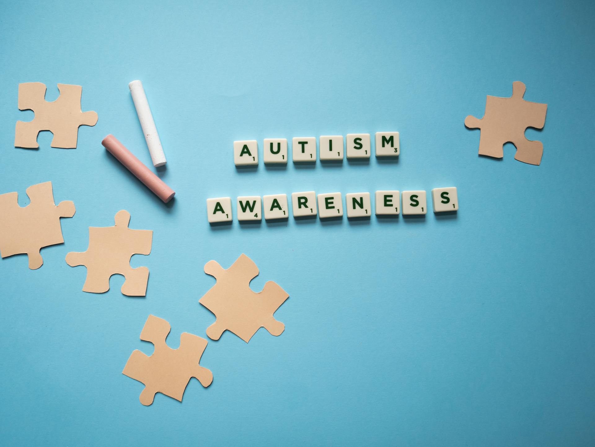 Scrabble Tiles of Autism Awareness on the Table