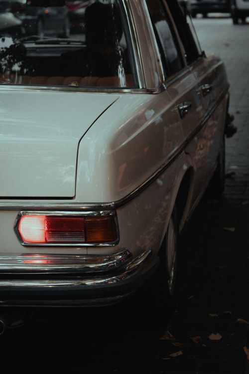 Free Elegant vintage Mercedes car parked on Istanbul street in a moody atmosphere. Stock Photo