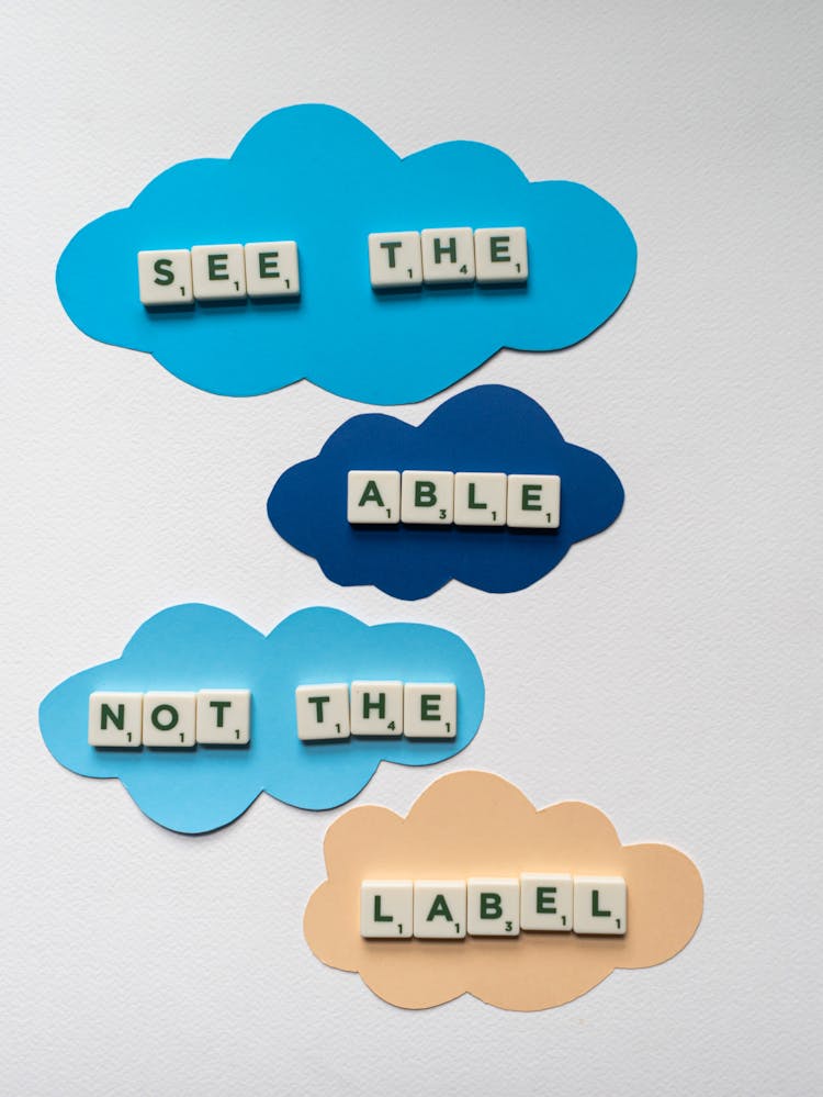 See The Able Not The Label Slogan On Cloud Cutouts