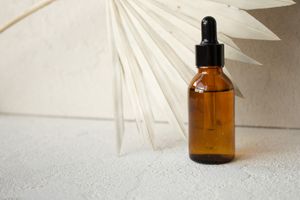 Amber glass dropper bottle — photo by Liana Horodetska on Pexels