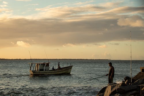 Free Balık tutmak, balıkçı, balıkçı teknesi içeren Ücretsiz stok fotoğraf Stock Photo