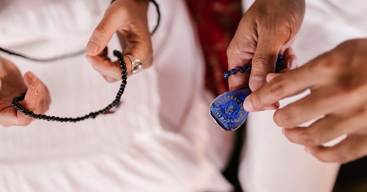 close-up of mala beads used for mantra repetition