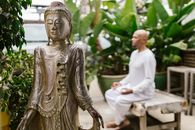 A Man Meditating in the Garden